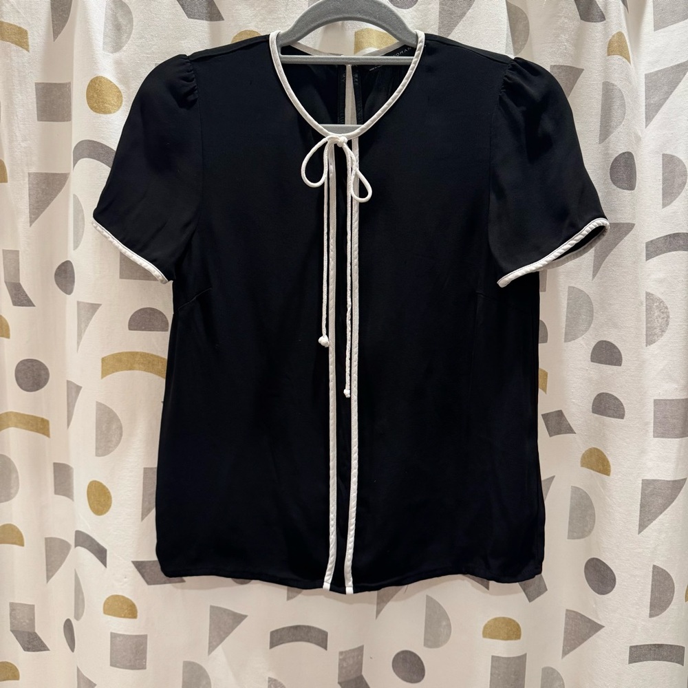 Elegant Black Women's Top with White Trim